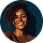 A smiling happy customer with curly hair on a blue background